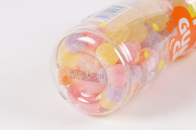 Gummy καραμέλα πηκτίνης βιταμίνης C τις πτώσεις γεύσης κόλας και ροδάκινων που διαμορφώνονται με