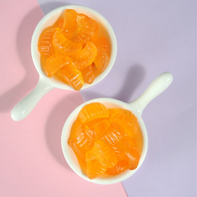 Διαμορφωμένα φρούτα πορτοκαλιά πηκτίνης Gummy πρόχειρα φαγητά φρούτων πηκτίνης βιταμίνης C καραμελών χρυσά